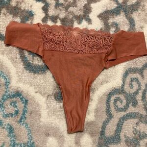 Seamless lace thong